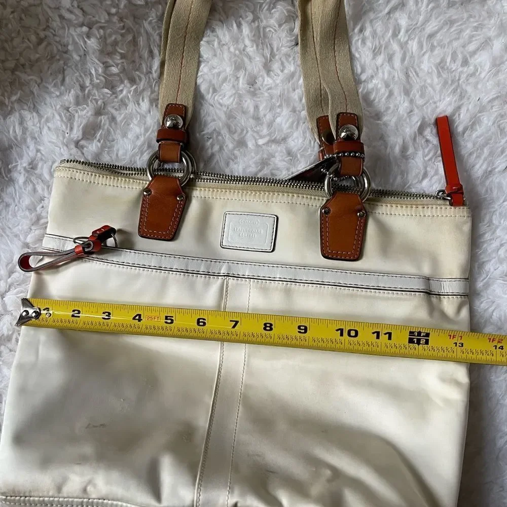 Coach Hampton Beige satin and orange accents satchel with silver tone hardwares